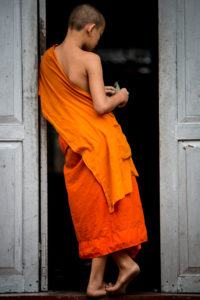 No matter where you go in Laos you will always encounter the vibrant orange of the monks.